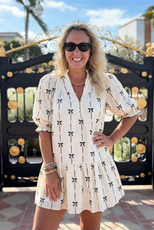 Bow & Tell Ruffle Mini Dress